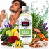 A bottle of Fizzy Whiz 1881 Fragrance Oil is centered, surrounded by illustrated and photographed scent ingredients including citrus, flowers, cinnamon, cloves, and greenery. A man in a white shirt appears in the background holding a perfume spray, with water droplets and a splash graphic around the bottle.
