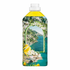 Bottle with a scenic design of a coastal town and lemon on a white background