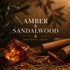 Amber & Sandalwood set in a dark brown background 