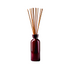 Dark purple glass reed diffuser bottle with long natural wooden reeds, shown upright on a light background.