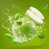 A graphic representation of a fresh green apple with water splashing around it, suggesting a lively and refreshing fragrance.