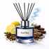 Reed diffuser labeled 'Bad Boy' with lemons, cinnamon sticks, and other elements on a white background
