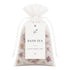 Bath tea package with a drawstring bag and a label on a white background