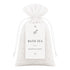 Bath tea packaging with a drawstring bag and label on a white background