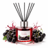 Red diffuser bottle labeled 'Black Cherry' with black cherries around on a white background