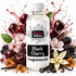 A bottle of Fizzy Whiz Black Cherry Fragrance Oil centered against a white background, surrounded by cherry blossoms, cherries, vanilla beans, and amber crystals in a stylized splash composition.