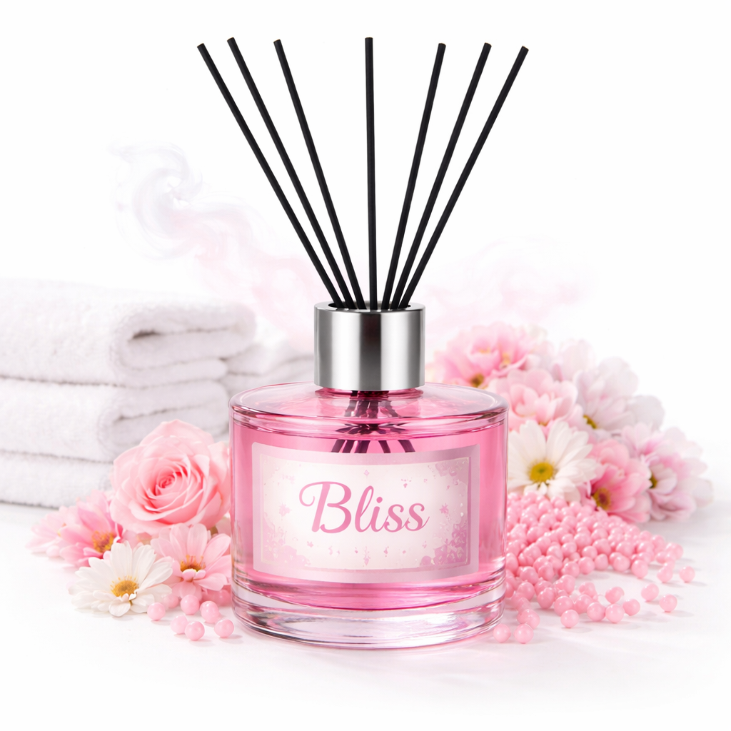 Pink diffuser labeled 'Bliss' with floral decorations on a white background