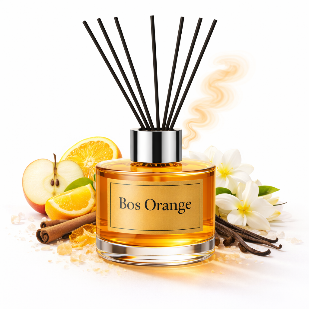 Reed diffuser labeled 'Bos Orange' with orange slices, apples, and flowers on a white background