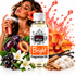 A bottle of Fizzy Whiz Bright Fragrance Oil centered on a white background, surrounded by fragrance ingredients including plums, a peach, white flowers, vanilla beans, cinnamon sticks, cotton, and a woman holding a perfume spray bottle with an orange liquid splash graphic behind her.