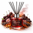 Reed diffuser labeled 'Burning Cherry' surrounded by cherries and flowers on a white background