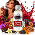 A bottle of Fizzy Whiz Burning Cherry Fragrance Oil centered in a stylized commercial composition, surrounded by cherries, roses, vanilla beans, cinnamon sticks, amber crystals, and a woman holding a perfume bottle against a white background with red liquid splashes.