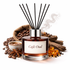 Cafe Oud diffuser with coffee beans, cinnamon sticks, and star anise on a white background