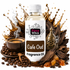 A bottle of Fizzy Whiz Cafe Oud Fragrance Oil centered against a white background, surrounded by coffee-themed props including a cup of espresso with steam, coffee beans, a wooden spoon, coffee powder, amber-colored candies, and a decorative metal incense holder. The bottle label reads 'Fizzy Whiz' and 'Cafe Oud Fragrance Oil'.