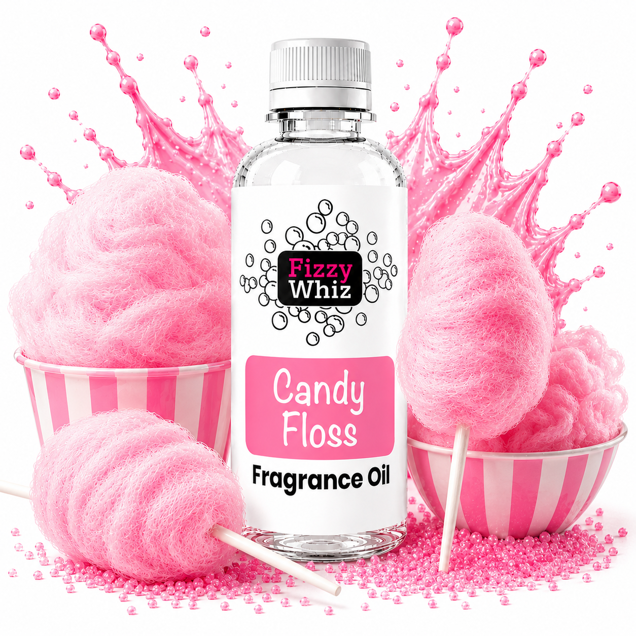 A bottle of Fizzy Whiz Candy Floss Fragrance Oil centered against a white background, surrounded by pink cotton candy, pink sprinkles, and pink liquid splash graphics. The bottle has a white cap, a clear glass body, and a white label with a pink section and black text.