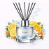 Diffuser with 'Capri' label surrounded by fruits and flowers on a white background