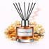 Diffuser labeled 'Caramel Popcorn' with decorative elements on a white background