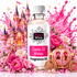 A bottle of Fizzy Whiz 'Castle Of Wishes' fragrance oil centered against a highly stylized, pink-themed fantasy background featuring a castle, roses, pearls, and a carriage.