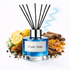 Reed diffuser labeled 'Code Male' with lemons, cinnamon sticks, and orange peel on a white background
