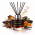 Dubai Black Reed Diffuser Oil with spices and vanilla pods wooden sticks on white background 