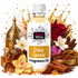 A bottle of Fizzy Whiz Dubai Special Fragrance Oil centered against a white background, surrounded by decorative props including a gold incense burner, red rose, white orchid, cinnamon sticks, amber pieces, and golden liquid splashes. The bottle label reads 'Fizzy Whiz' and 'Dubai Special Fragrance Oil'.