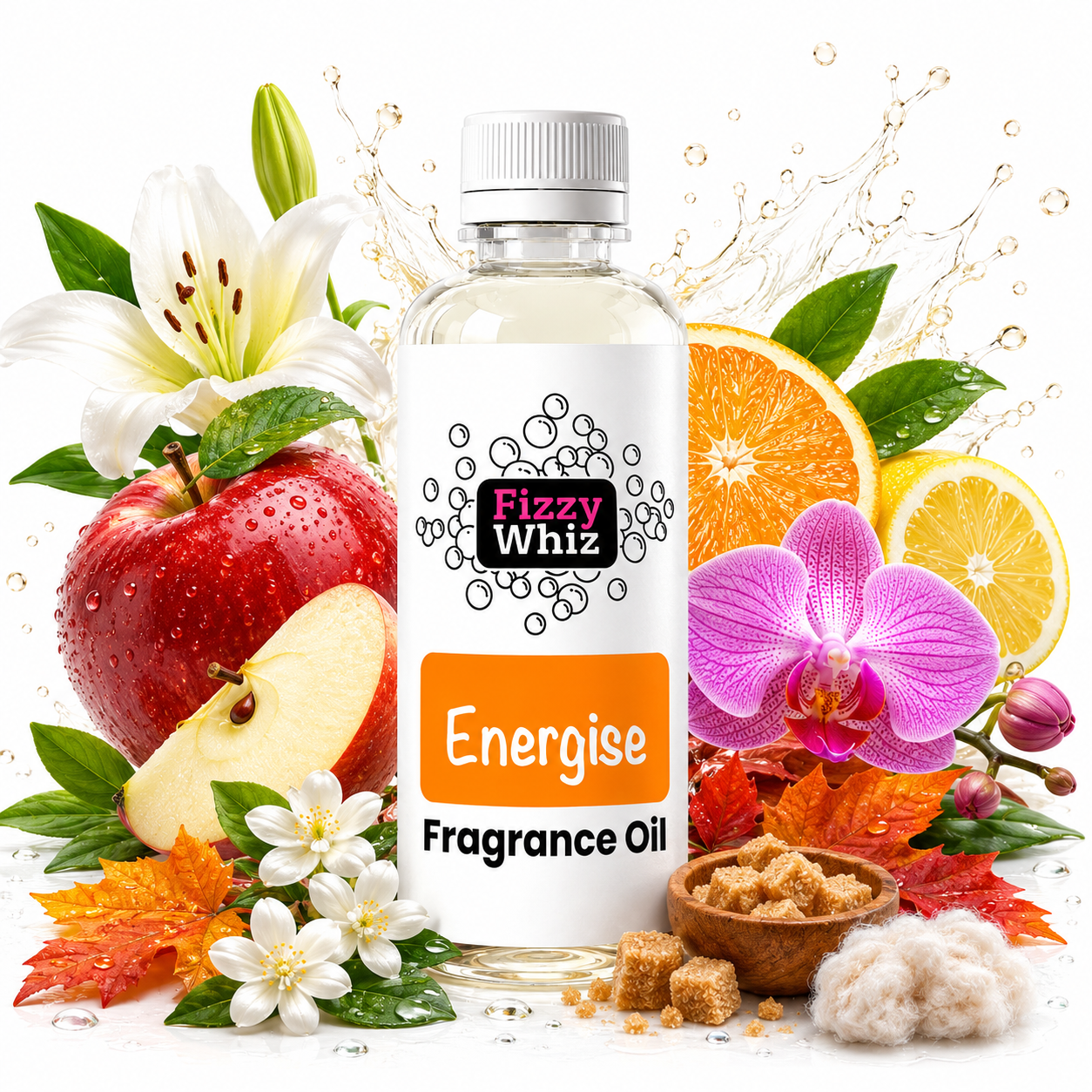 A bottle of Fizzy Whiz Energize fragrance oil centered on a white background, surrounded by fruit and botanical elements including an apple, orange slices, a pink orchid, white flowers, leaves, and small brown sugar cubes. The bottle label reads 'Fizzy Whiz' and 'Energize Fragrance Oil.