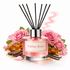Fakher Rose diffuser with pink roses and vanilla beans on a white background
