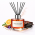 Farenheight diffuser with orange, cinnamon, and leaf elements on a white background
