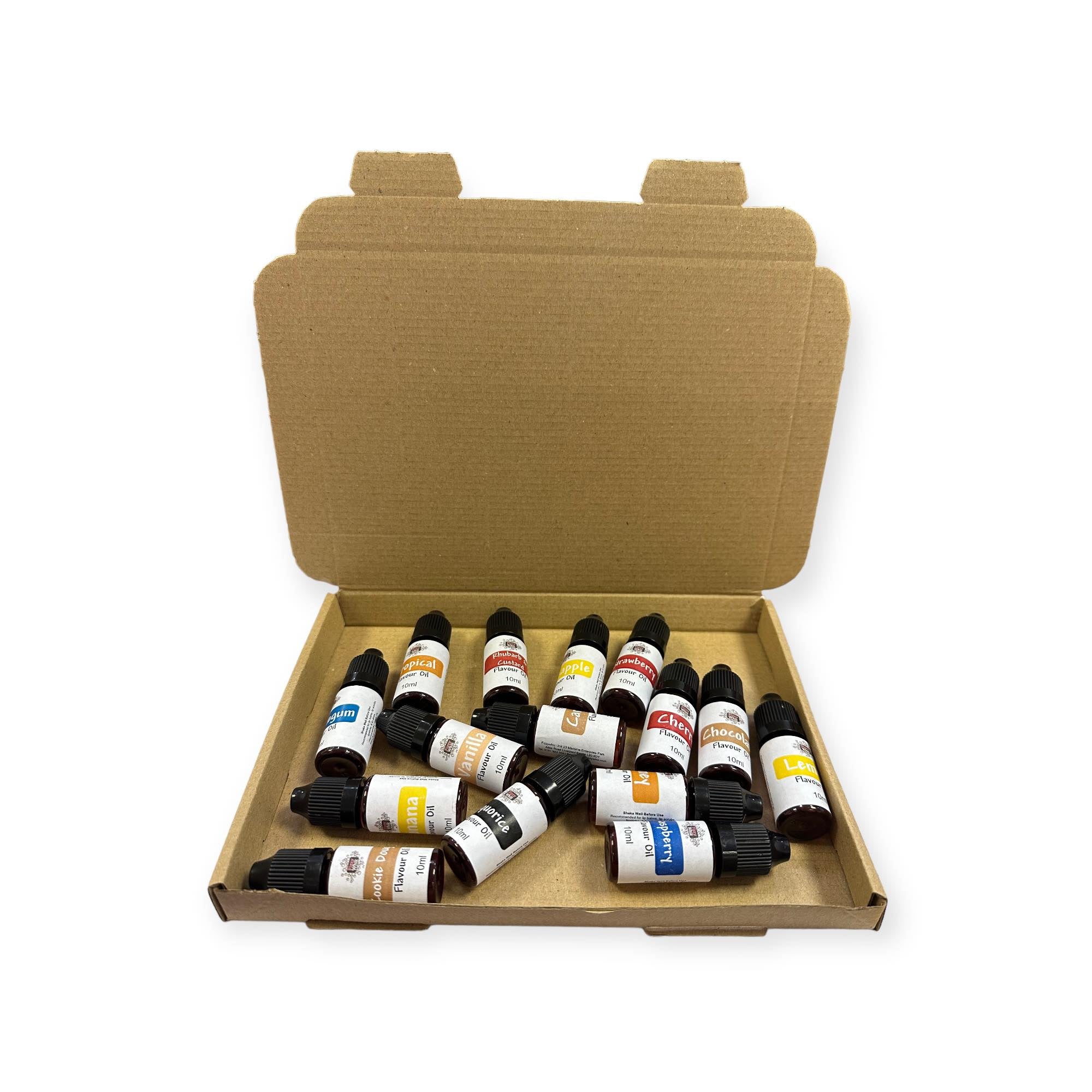 A box open to reveal multiple small bottles of different colored flavour oils, Raspberry (Blue), Vanilla, Banana, Bubblegum, Cherry, Chocolate, Honey
Cookie Dough, Lemon, Pineapple, Rhubarb &amp; Custard, Strawberry, Tropical, Caramel.