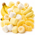 A pile of banana-flavored snacks and sweets on a white background, including whole and sliced bananas, soft yellow marshmallows, and yellow candy pieces with a sugar coating.