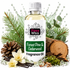 A bottle of Fizzy Whiz Forest Pine & Cedarwood Fragrance Oil centered on a white background, surrounded by pine needles, a pinecone, vanilla beans, a wood slice, and ice crystals to suggest a natural scent.