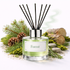 Reed diffuser labeled 'Forest' with decorative elements on a white background