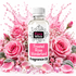 A bottle of Fizzy Whiz Fragrance Oil labeled 'Frosted Rose Wonderland' is centered in front of a floral arrangement of pink roses, petals, and small flowers with pink splash graphics behind it on a white background.