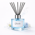 Diffuser with black sticks and 'Ghosts' label on a white background