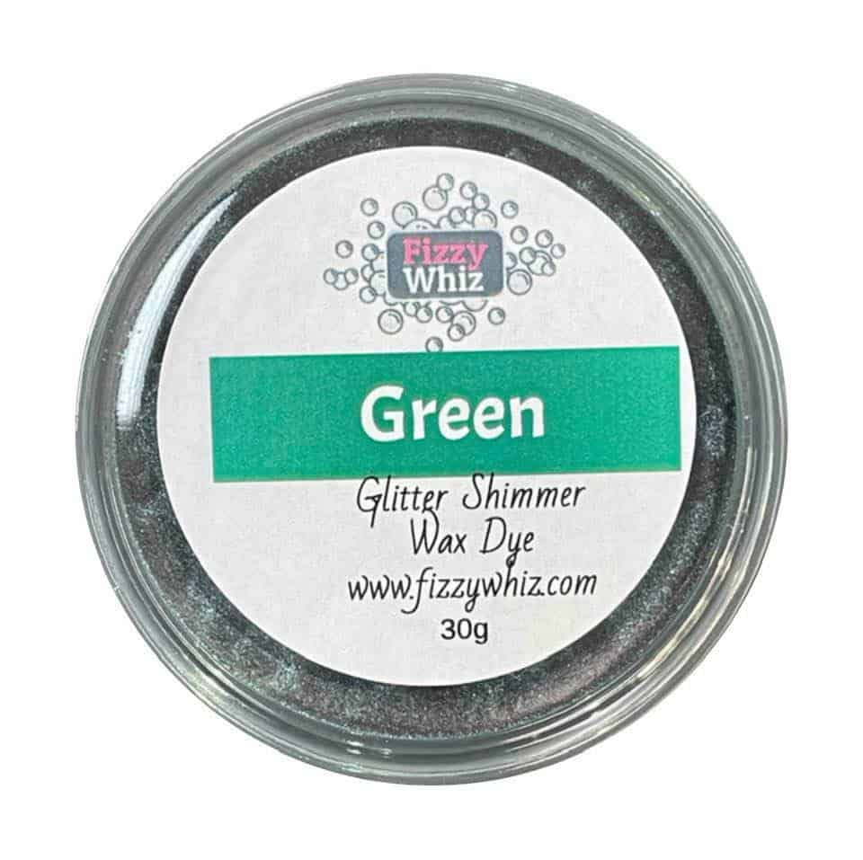 A pot labeled 'Green' Glitter Shimmer Wax Dye by Fizzy Whiz, containing a mixture of glitter and shimmer particles.