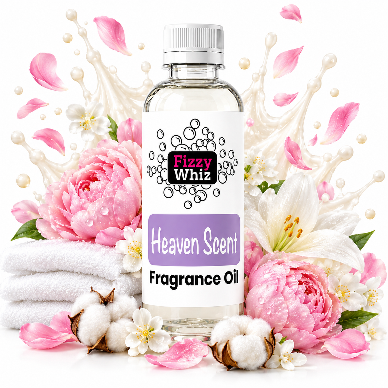 A clear bottle of Fizzy Whiz Heaven Scent Fragrance Oil with a white cap and white label, surrounded by pink peonies, white lilies, cotton bolls, folded white towels, and pink flower petals on a white background.
