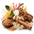A styled botanical arrangement on a white background featuring white, yellow, and pink flowers with green leaves, cinnamon sticks, a small wooden bowl filled with brown powder, and scattered loose powder, alongside a piece of bark.