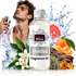 A bottle of Fizzy Whiz Invictus Fragrance Oil centered in a promotional composition, surrounded by citrus slices, flowers, leaves, ice, and a man spraying fragrance oil. The bottle label reads 'Fizzy Whiz' and 'Invictus Fragrance Oil'.