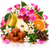 A styled arrangement of caramel cubes, sliced pear, whole pear, orange segments, pink orchids, white flowers, green leaves, pink petals, and dark brown bark pieces on a white background.