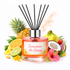 Reed diffuser labeled 'Jamaican Me Crazy' with tropical fruits and flowers on a white background