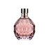 A bottle of J Choo fragrance oil with a pink hue and a clear, textured glass design.