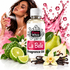 A bottle of Fizzy Whiz La Belle fragrance oil centered on a white background, surrounded by fragrance ingredients including a pear, lime slices, vanilla beans, a flower, and a woman holding a perfume spray bottle in the upper left. Pink liquid splash graphics appear behind the bottle.