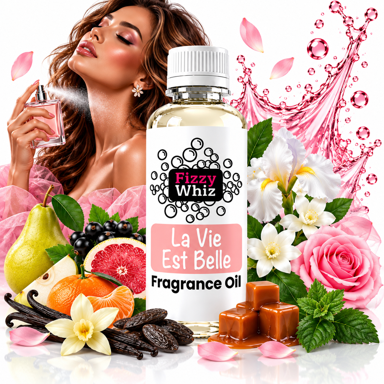 A bottle of Fizzy Whiz La Vie Est Belle fragrance oil centered on a white background, surrounded by perfume spray, pink roses, pears, citrus, vanilla beans, mint, and caramel cubes. A woman holding a perfume bottle appears in the upper left, and pink petals and a pink liquid splash graphic decorate the scene.