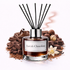 Reed diffuser labeled 'Lavish Chocolate' surrounded by chocolate-themed decor on a white background