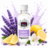 A bottle of Fizzy Whiz Lemon Lavender Fragrance Oil centered against a white background with decorative lemon slices, lavender sprigs, a white flower, and purple liquid splashes behind it.