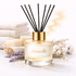 Reed diffuser labeled 'Marseille' with black reeds on a light background
