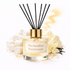 Reed diffuser labeled 'Marshmallow Buttercream' with decorative elements on a white background