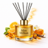 Miss Million diffuser with orange slices, flowers, and honeycomb on a white background