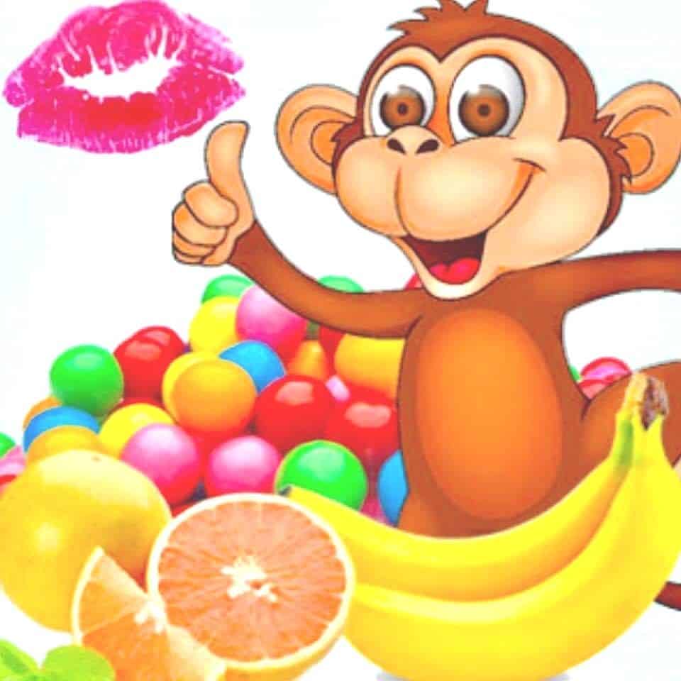 A colorful illustration featuring a cartoon monkey with a thumbs up, surrounded by various fruits like bananas and oranges, and a lipstick mark.