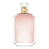 Pink perfume bottle with a gold cap on a white background