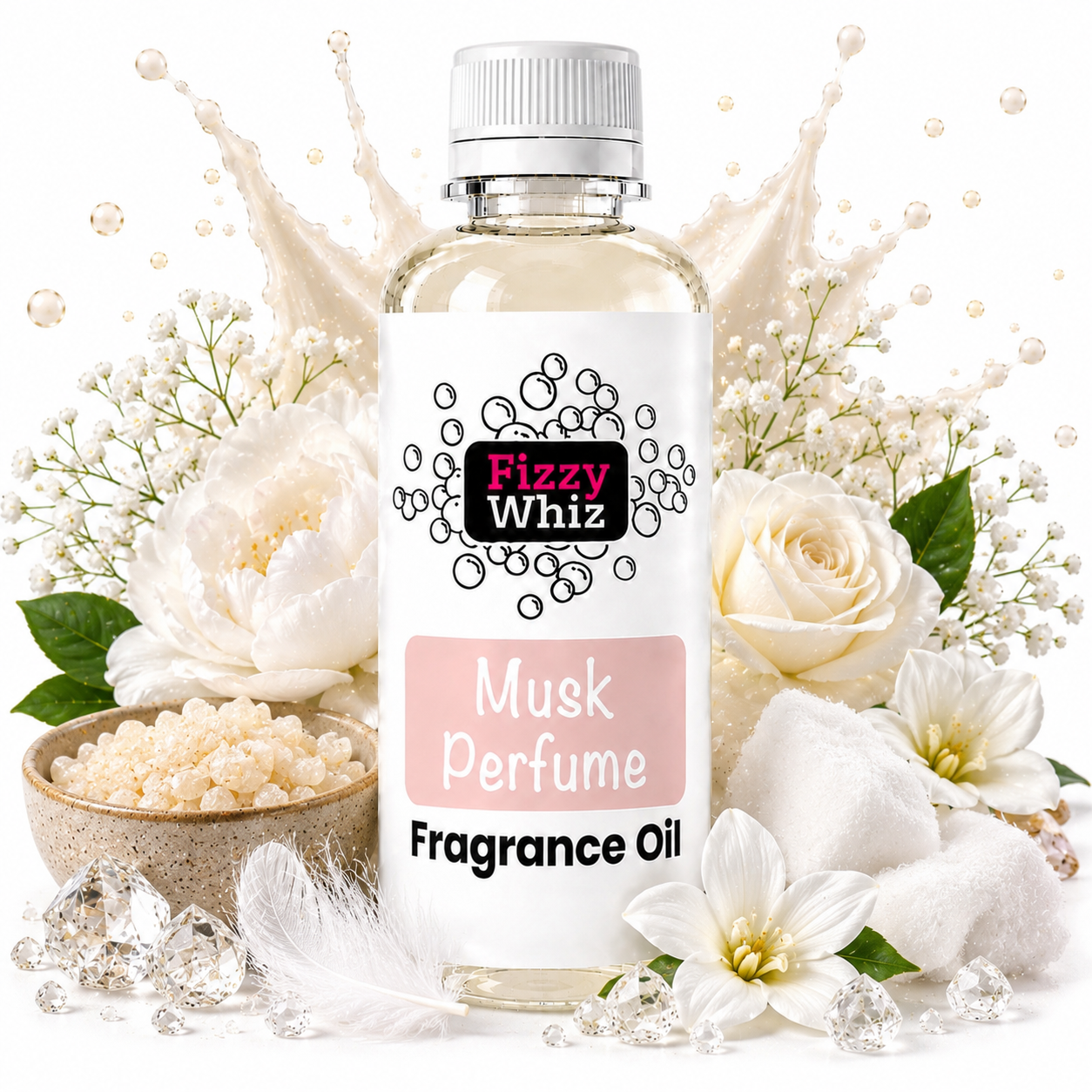 A bottle of Fizzy Whiz Musk Perfume Fragrance Oil centered against a white background, surrounded by decorative props including white roses, baby's breath, cotton balls, crystals, and a splash of liquid. The bottle has a white cap and a white label with pink and black text.